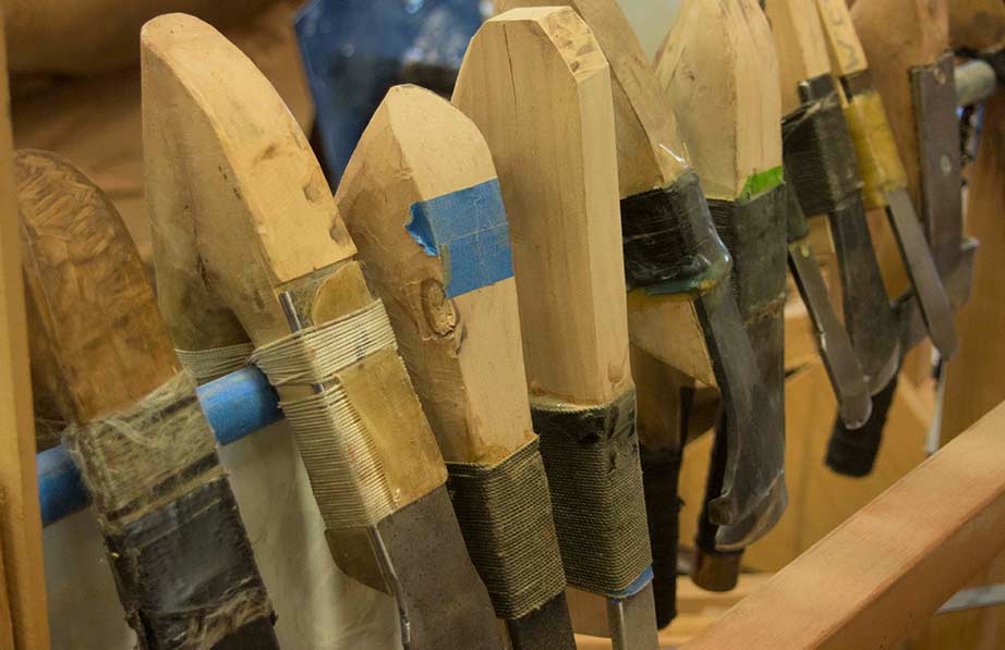 A rack holding a collection of clamps and tools