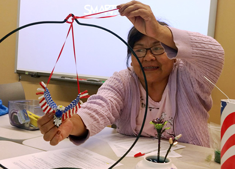 Roxanne Banguis sharing beading skills for Hibulb Culture Series in May, 2015, at Tulalip just north of Seattle.